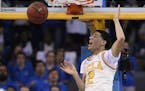 UCLA guard Lonzo Ball dunks during the first half of the team's NCAA college basketball game against Washington State, Saturday, March 4, 2017, in Los