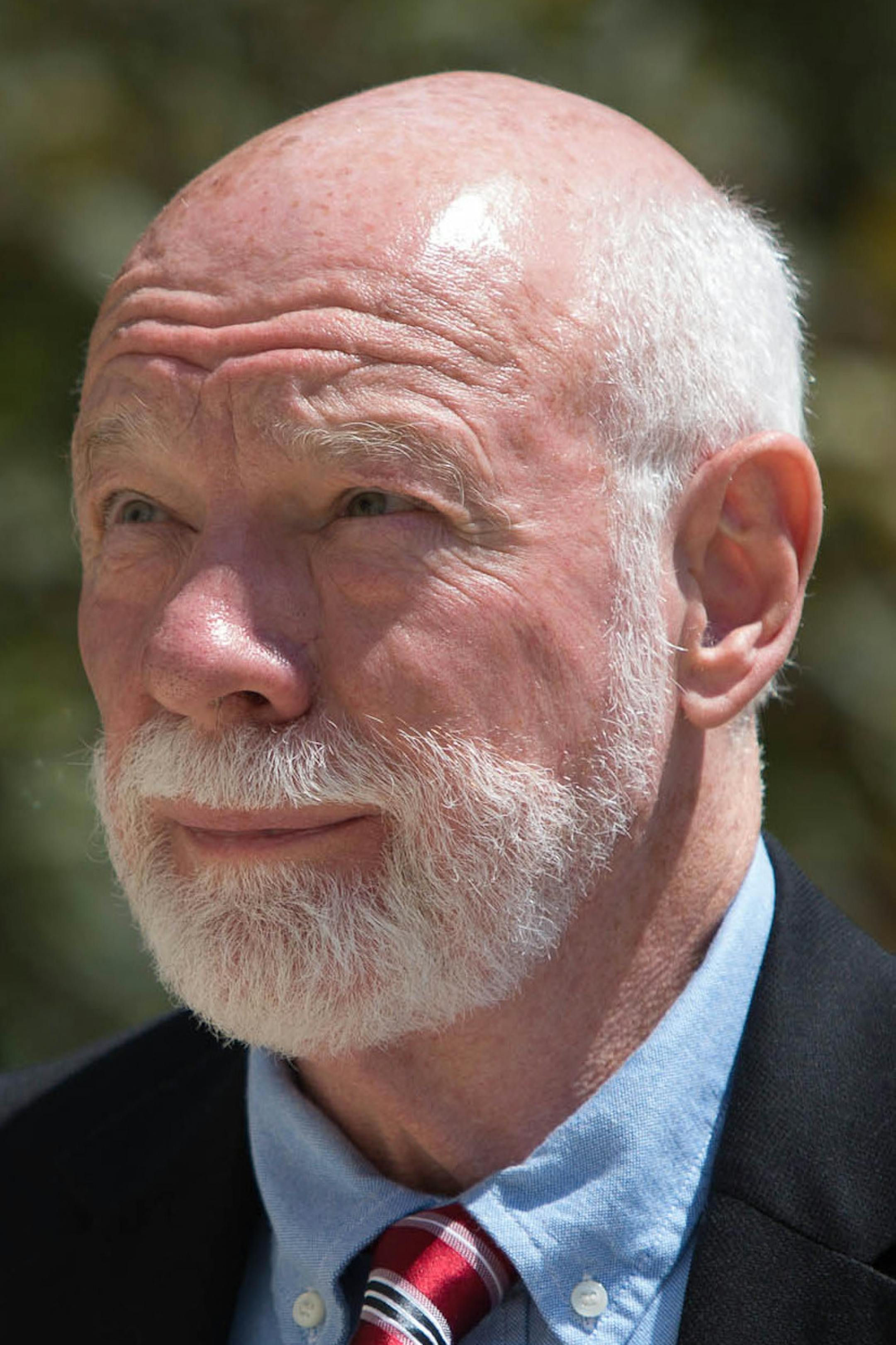 Lynn Seibel walks into the Rice County Courthouse Friday, July 12, 2013 in Fairbault, Minn. Seibel, a former Shattuck-St. Mary's teacher pleaded guilty Friday to sexually abusing six students at the Faribault boarding school more than a decade ago. (AP Photo/Minnesota Public Radio, Jennifer Simonson)