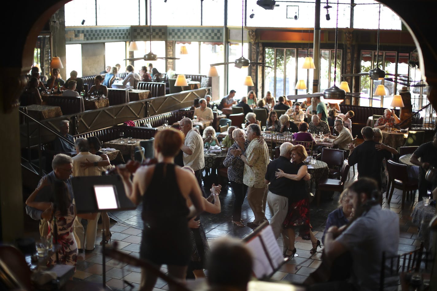 Tango dancers fill the dance floor as Rogue Tango, a string quartet, provided the live music. ] JEFF WHEELER &#xef; jeff.wheeler@startribune.com Dancing keeps us mentally sharp, researchers say, and dancing the tango is best of all because it demands an intense focus between partners. The Loring Pasta Bar in Dinkytown is host to an open dance night every Sunday for people who tango. Dancers were photographed Sunday night, June 4, 2017 at the Loring Pasta Bar in Dinkytown.