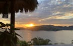 Sunsets in Zihuatanejo, Mexico, come highly recommended. (Tim Schnupp/Tribune News Service/TNS) ORG XMIT: 1378399