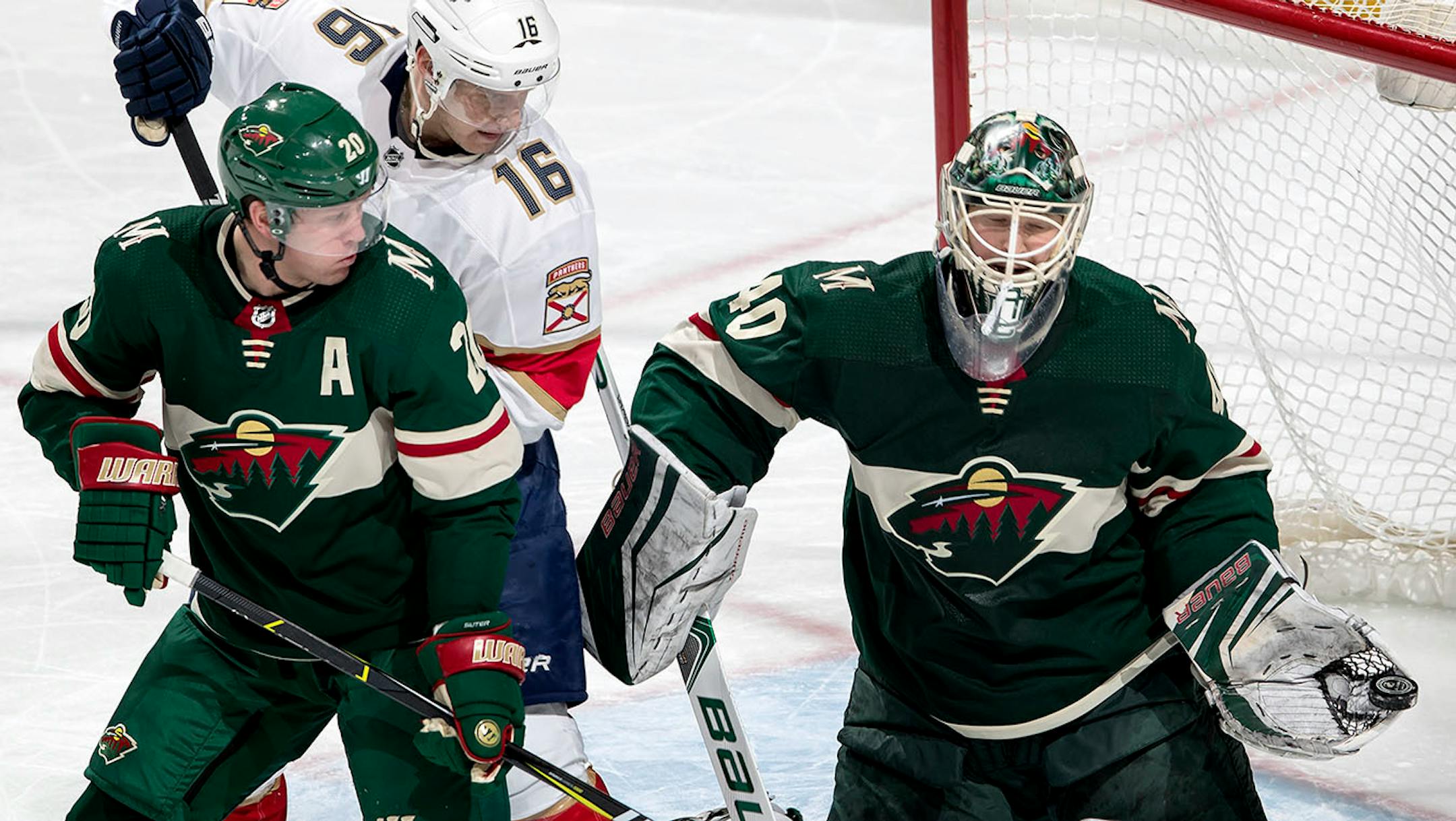 Wild goalie Devan Dubnyk (40) made a glove save in the third period.