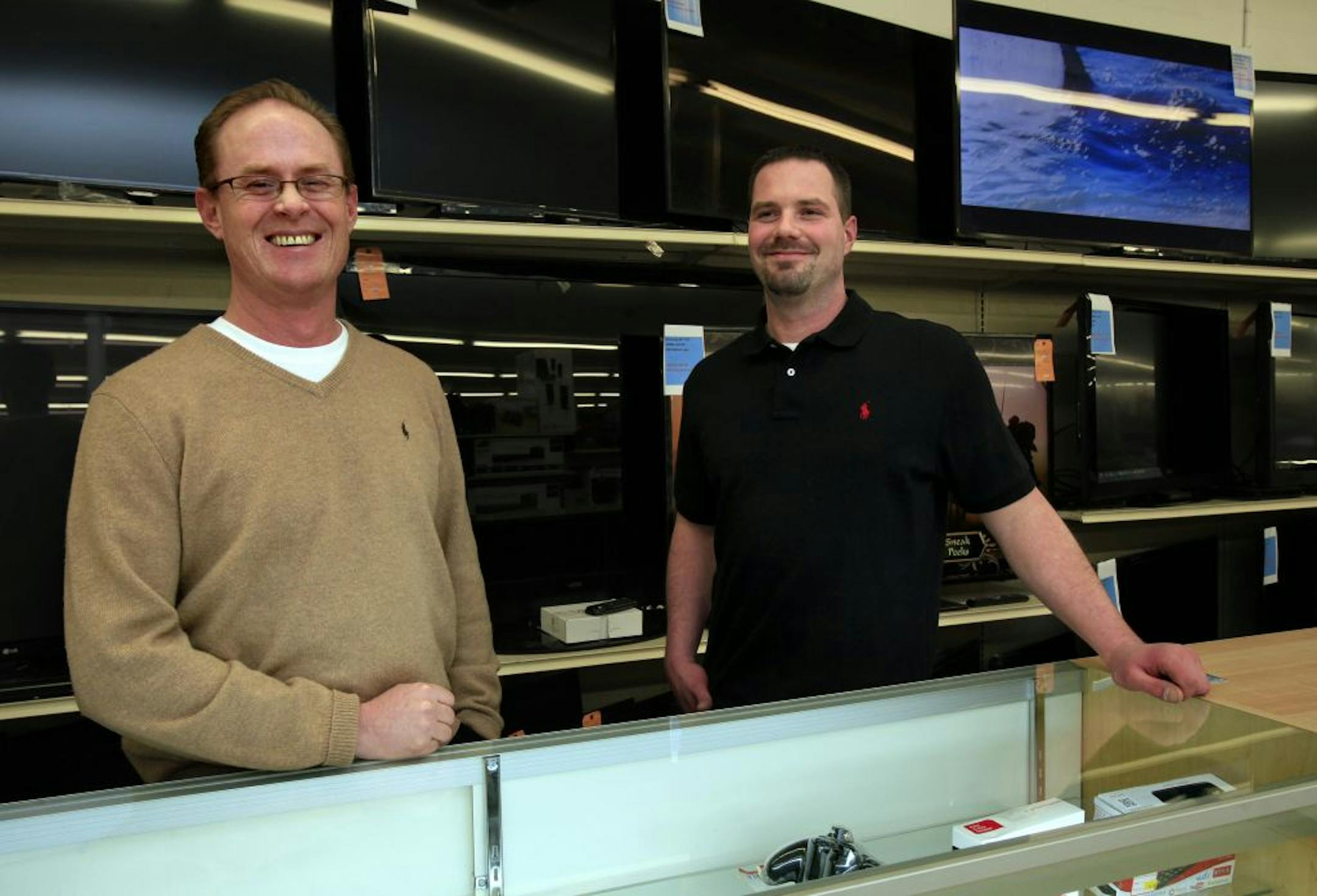 L to R: Store Supervisor Tom Canfield andStore Manager Josh Hagberg at the Salvation Army store in Fridley, MN on January 10, 2013.