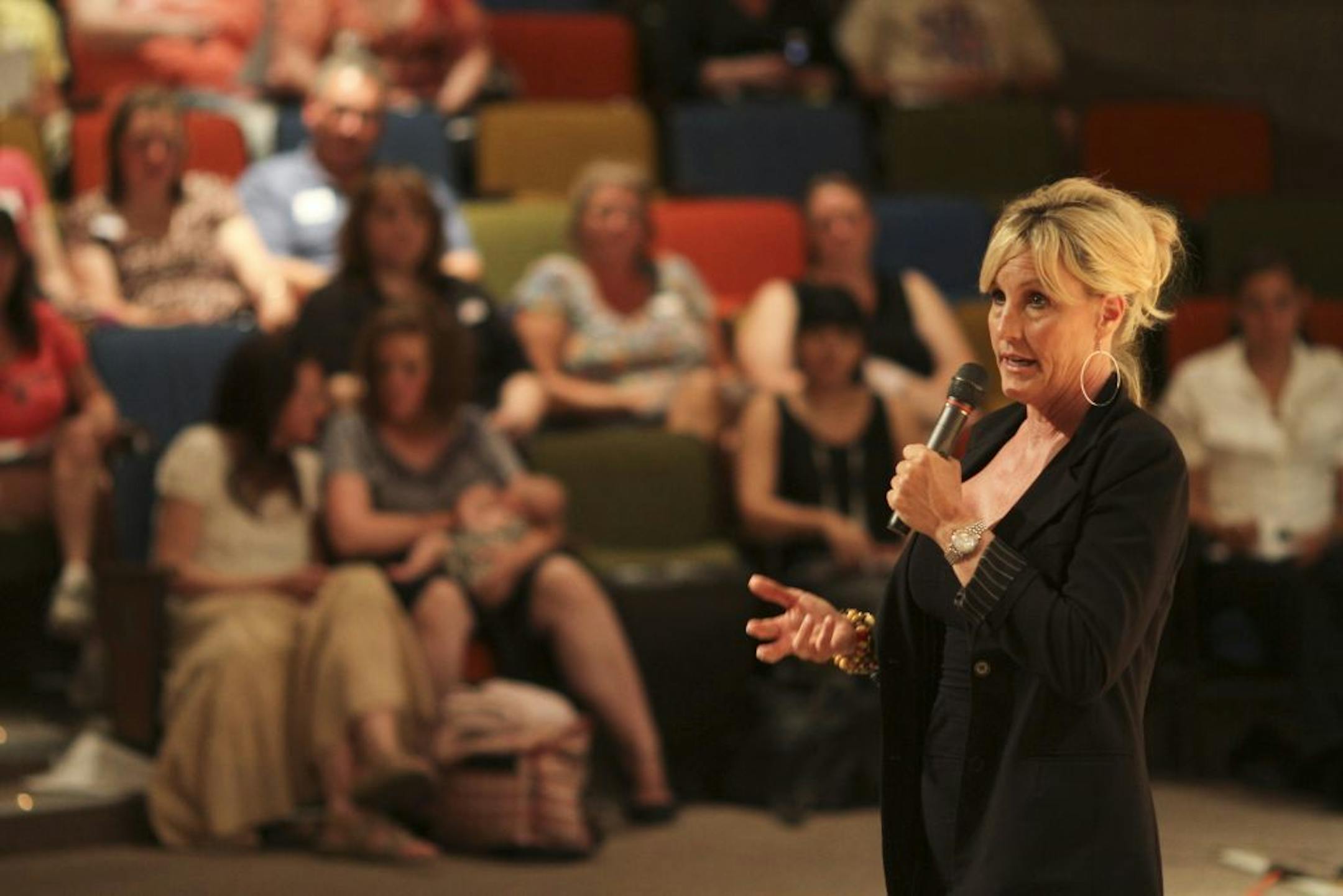 Environmental crusader Erin Brockovich and her team were in Fridley, Minn. Wednesday, June 27, 2012 to tour Superfund toxic waste sites and address residents at a town hall meeting in the high school auditorium. Erin Brockovich addressed the audience at a town meeting in the Fridley High School auditorium Wednesday night.