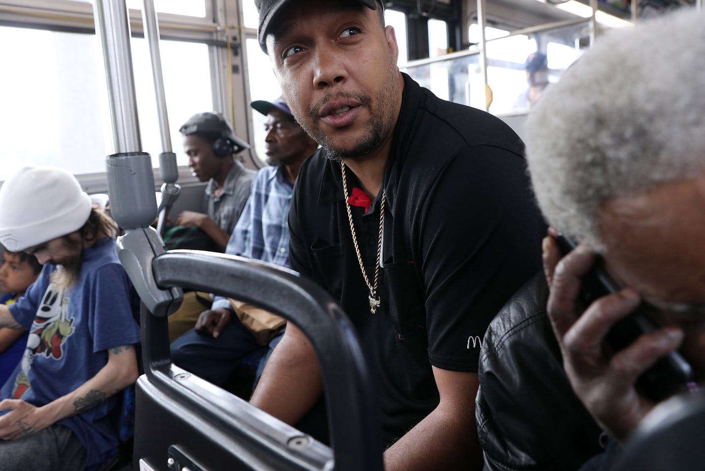 McDonald's employee Steven Suffridge rode a Metro Transit bus to his shift Tuesday. ] ANTHONY SOUFFLE &#xef; anthony.souffle@startribune.com McDonald's employee Steven Suffridge rode a Metro Transit bus to his shift Tuesday, May 22, 2018 in Minneapolis. Suffridge's McDonald's paid him below minimum wage. The city is getting ready to make an example out of McDonald's for paying employees under the new $10 min wage. We have records showing they owe $2,000+ in backpay to employees for skimming of t