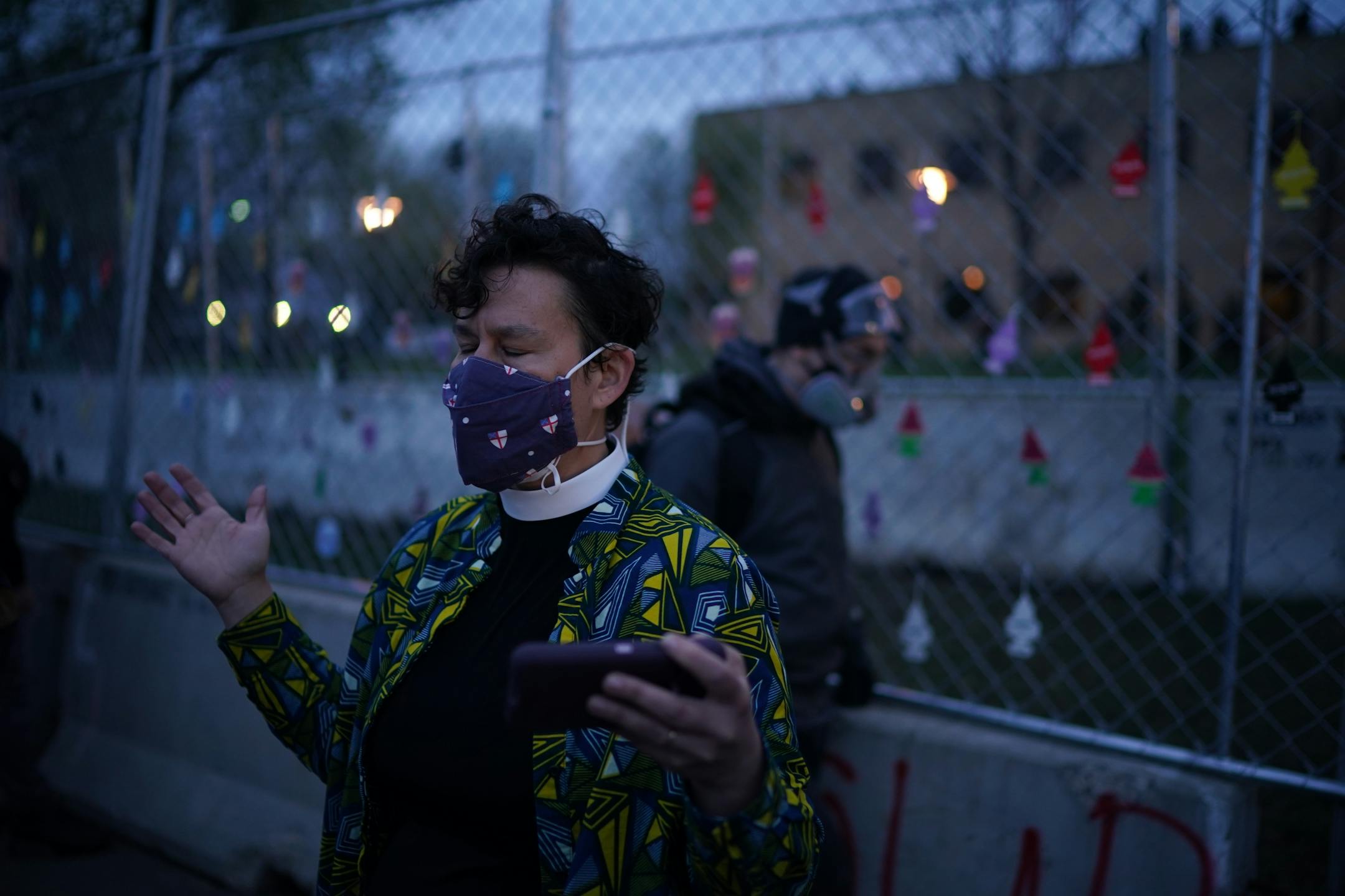 Rev. Joy Caires prayed as she and other clergy were there to bear witness after a call from the MN Council of Churches.
