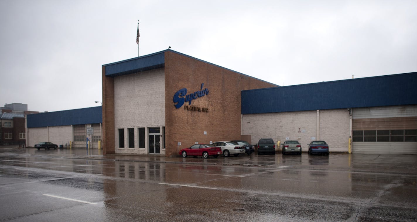 The lobby of Superior Plating in N.E. Minneapolis is empty and looks out onto 1st Ave. N.E. The 92-year-old company is closing. ] GLEN STUBBE * gstubbe@startribune.com