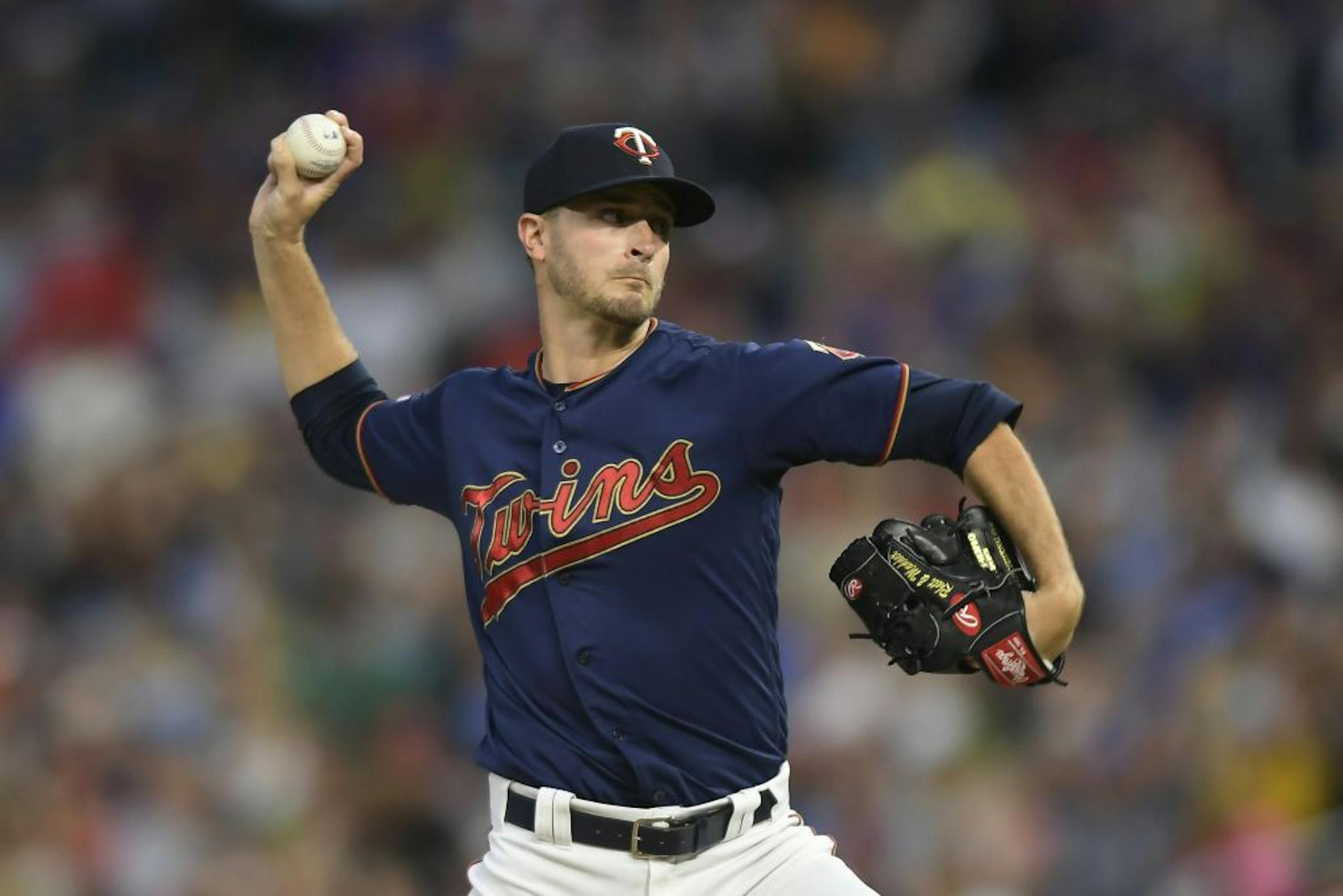 Minnesota Twins starting pitcher Jake Odorizzi (12) threw a pitch against the Cleveland Indians in the top of the first inning.