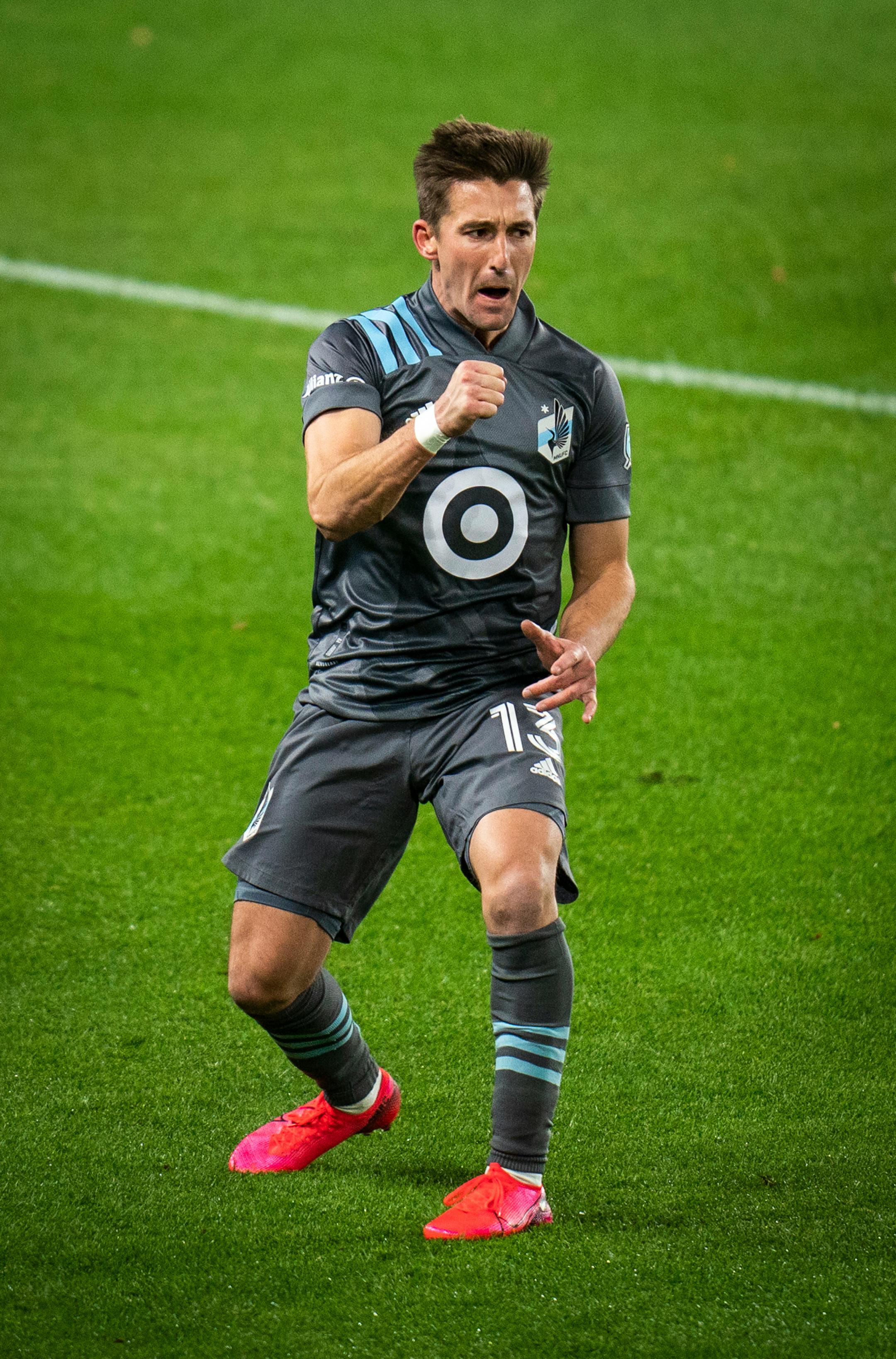 Minnesota United midfielder Ethan Finlay (13) celebrated his second goal during the first half.