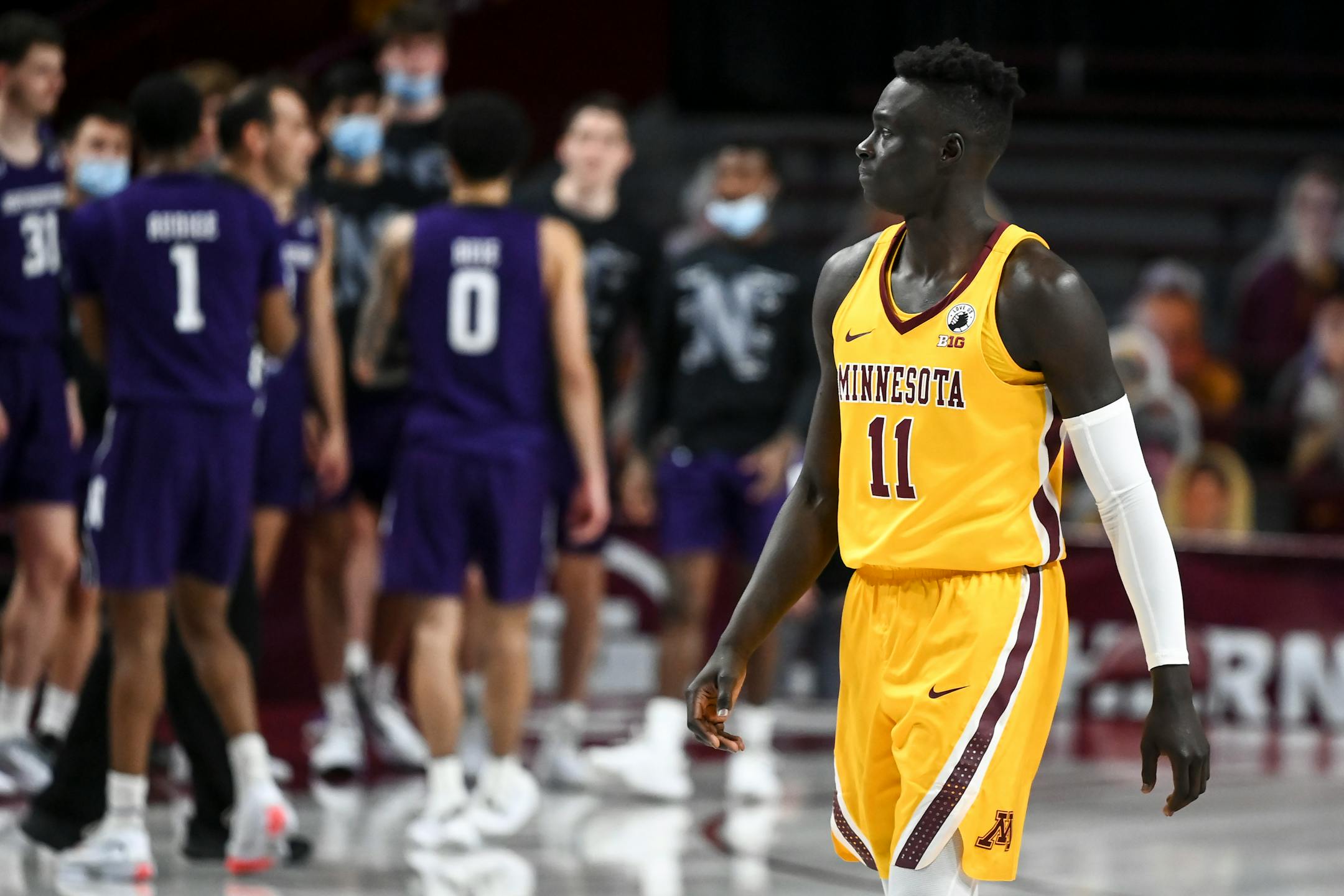 Minnesota Gophers guard Both Gach (11) was dejected after his team's loss against the Northwestern Wildcats