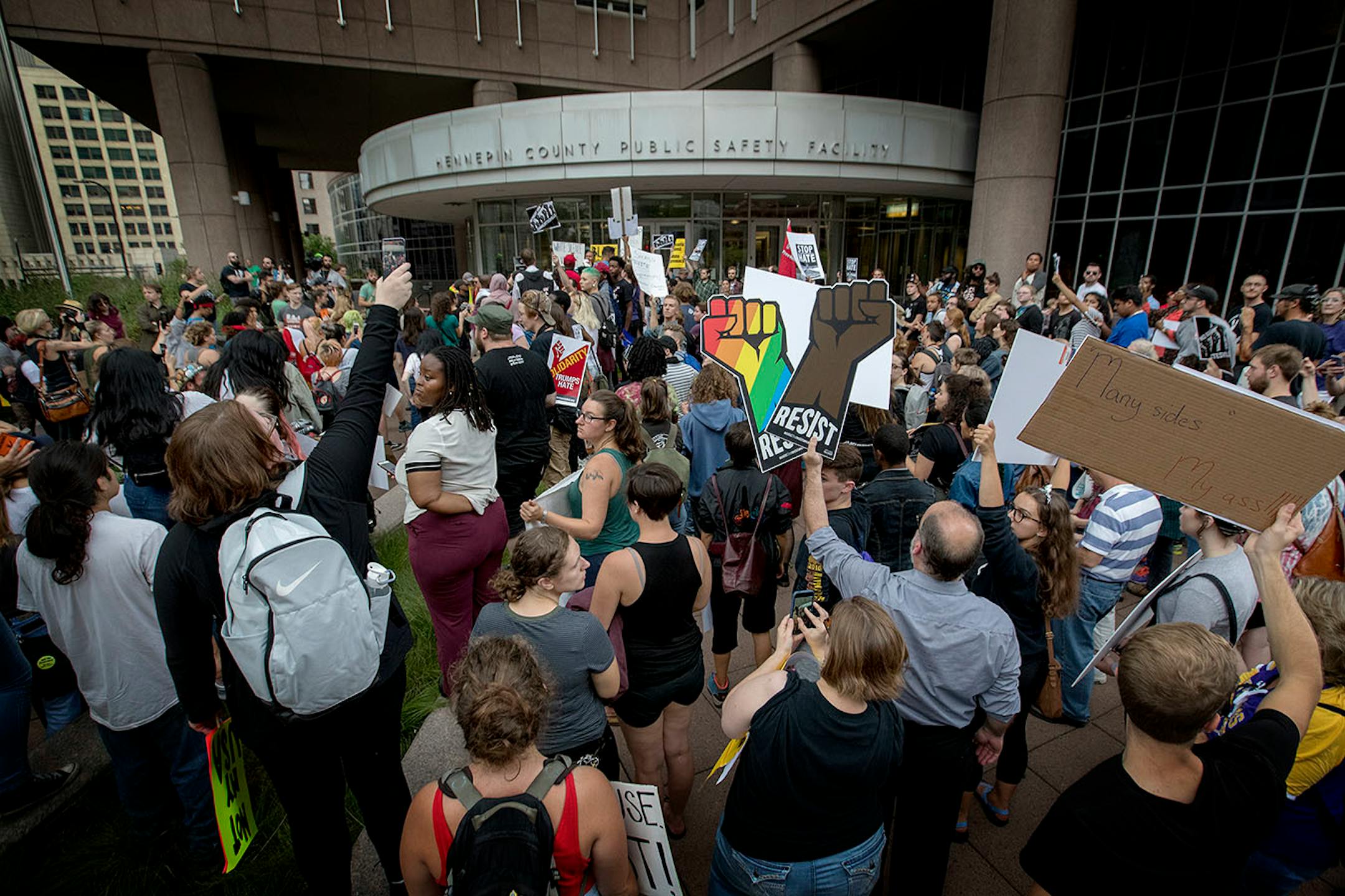 Demonstrators gathered at the Hennepin County Center during the Solidarity with anti-racists in Charlottesville march that ended in downtown Minneapolis on Monday.