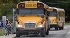 Students board buses at Frances Slocum Elementary School in Marion, Ind., after classes on Thursday, Aug. 16, 2018. Marion Community Schools is lookin