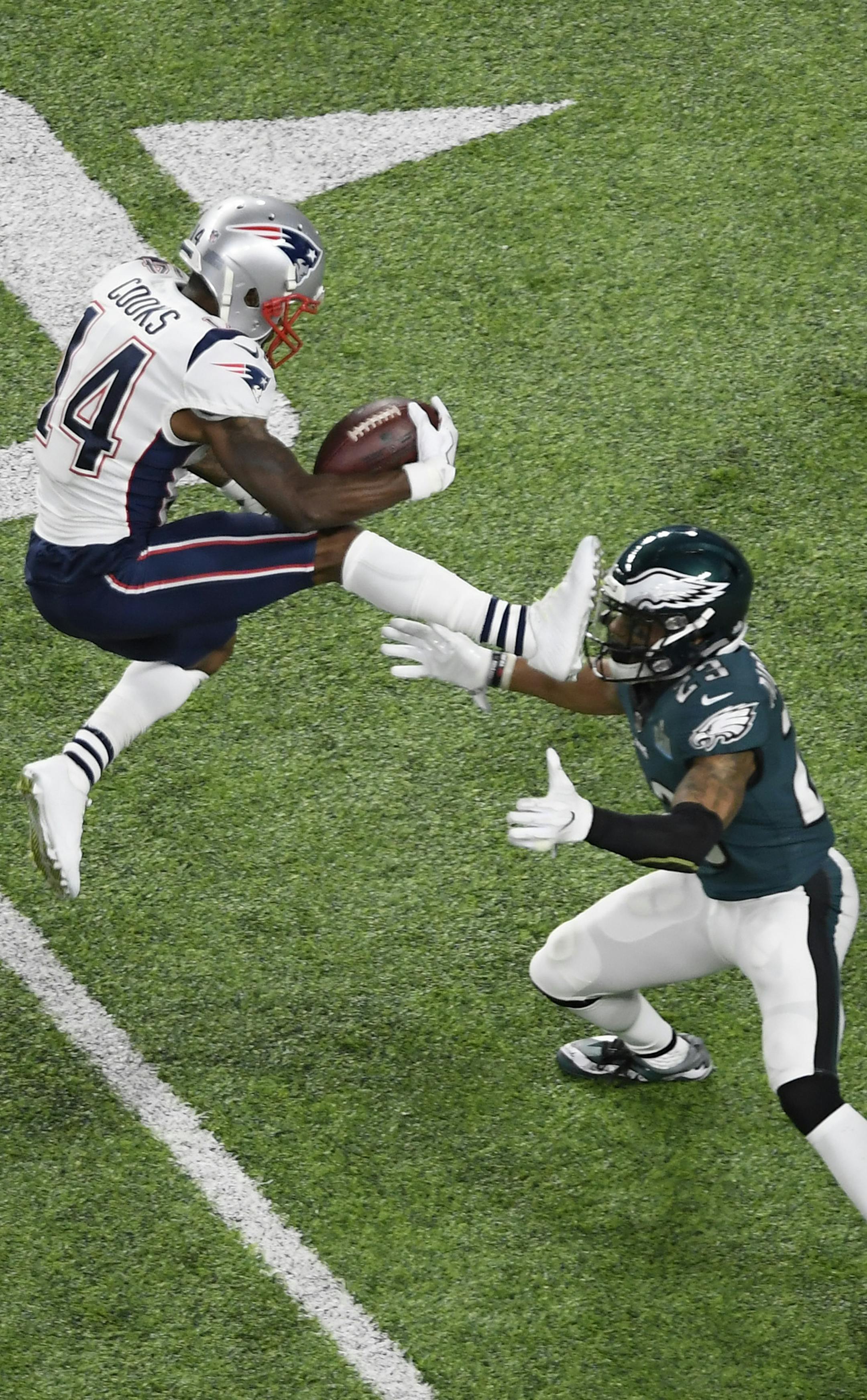 New England Patriots wide receiver Brandin Cooks (14) tried to jump over Philadelphia Eagles free safety Rodney McLeod (23) during the second quarter of Super Bowl LII. ] (AARON LAVINSKY/STAR TRIBUNE) aaron.lavinsky@startribune.com hotfot