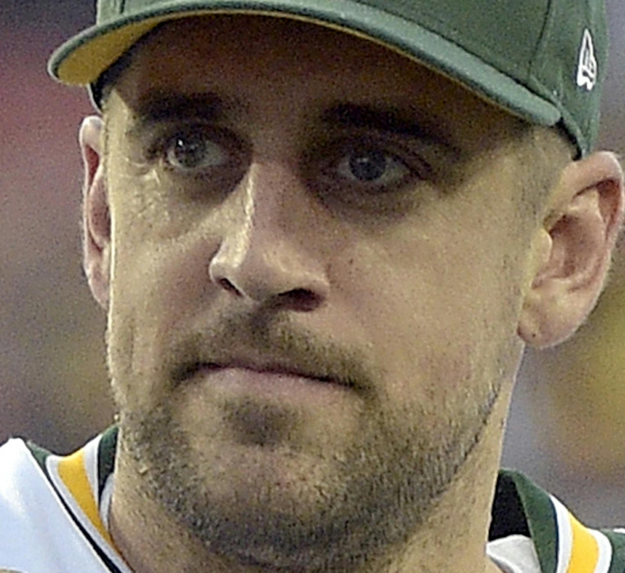 Green Bay Packers quarterback Aaron Rodgers (12) gives the thumbs up to fans as he leaves the field following the team's 20-3 win over the Tampa Bay Buccaneers during an NFL football game Sunday, Dec. 21, 2014, in Tampa, Fla. (AP Photo/Phelan M. Ebenhack)