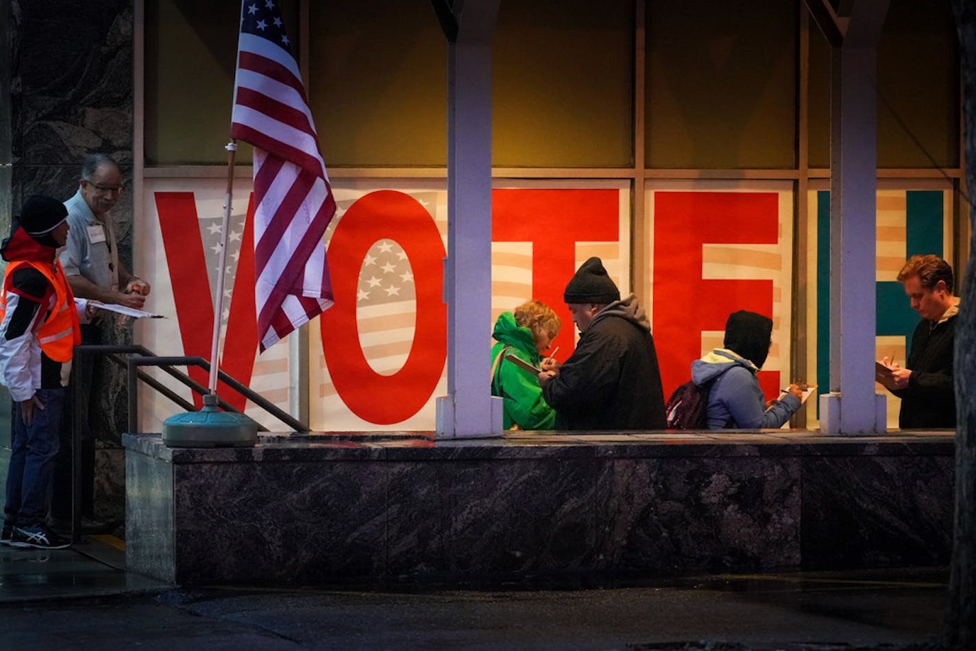 Voters lined up to vote early at the Minneapolis early voting center in November 2018.