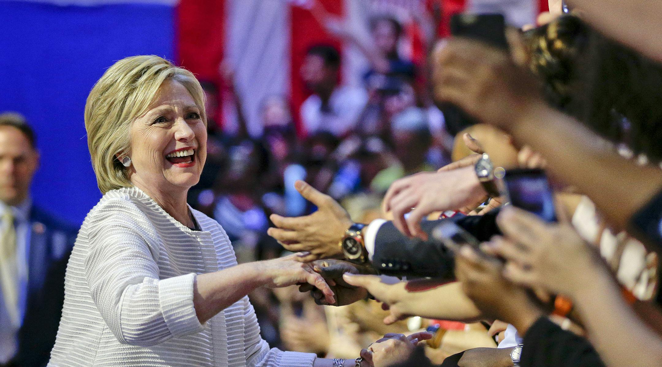 Democratic presidential candidate Hillary Clinton greets supporters as she arrives to speak during a presidential primary election night rally, Tuesday, June 7, 2016, in New York. (AP Photo/Julie Jacobson) ORG XMIT: MIN2016060810462623