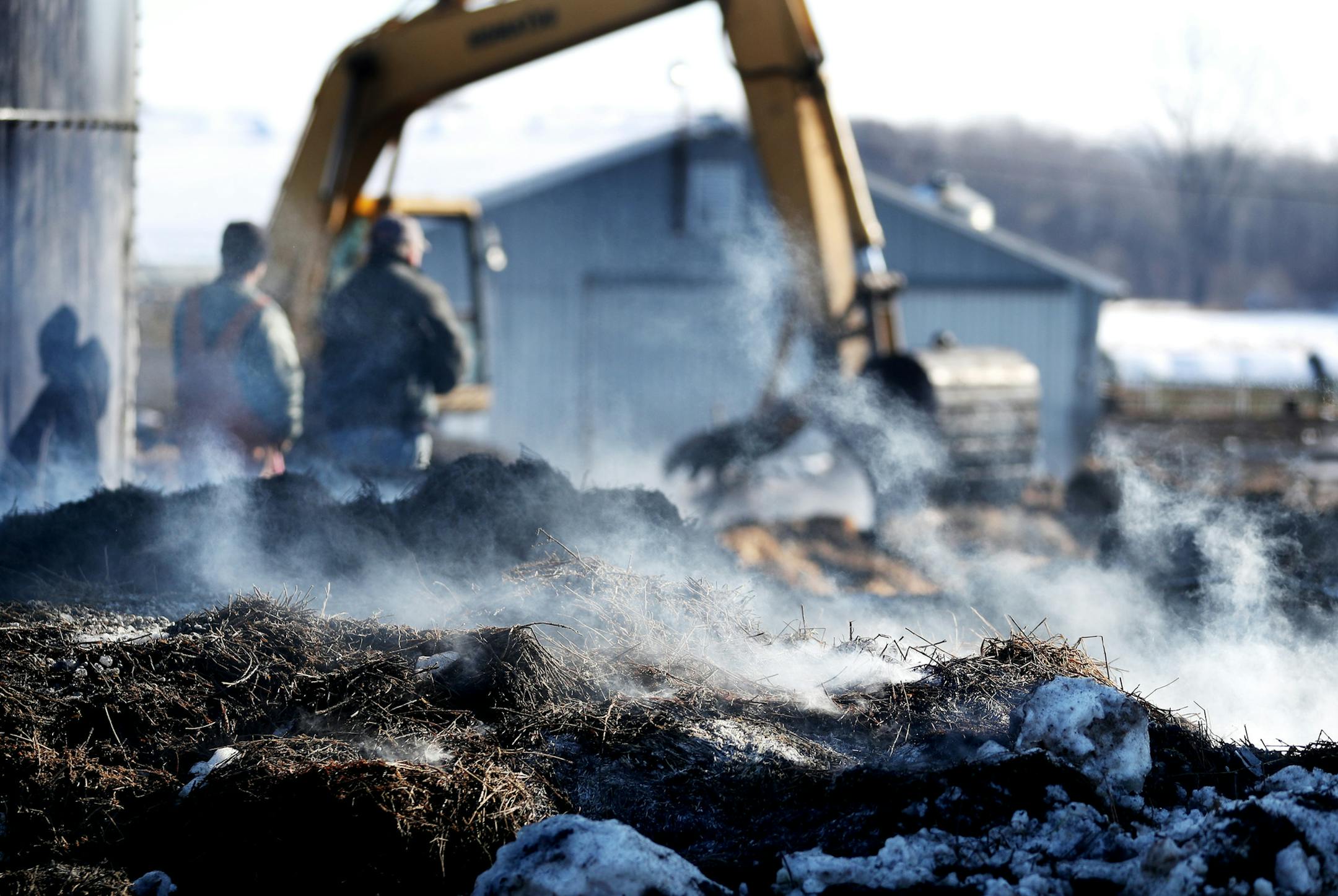 Fire smolders as workers clean up debris from the fire-gutted barn of Ray and Cindy Deutsch where a fire last week killed 63 of their dairy cattle and was seen Wednesday, Jan. 18, 2016, in Elko New Market, MN.](DAVID JOLES STARTRIBUNE)djoles@startribune.com A Scott County dairy farm has been shuttered from a tragic fire that engulfed a century-old barn and killed 63 dairy cows -- the majority of Ray and Cindy Deutsch's herd. The second-generation farmers have witnessed an outpouring of support f