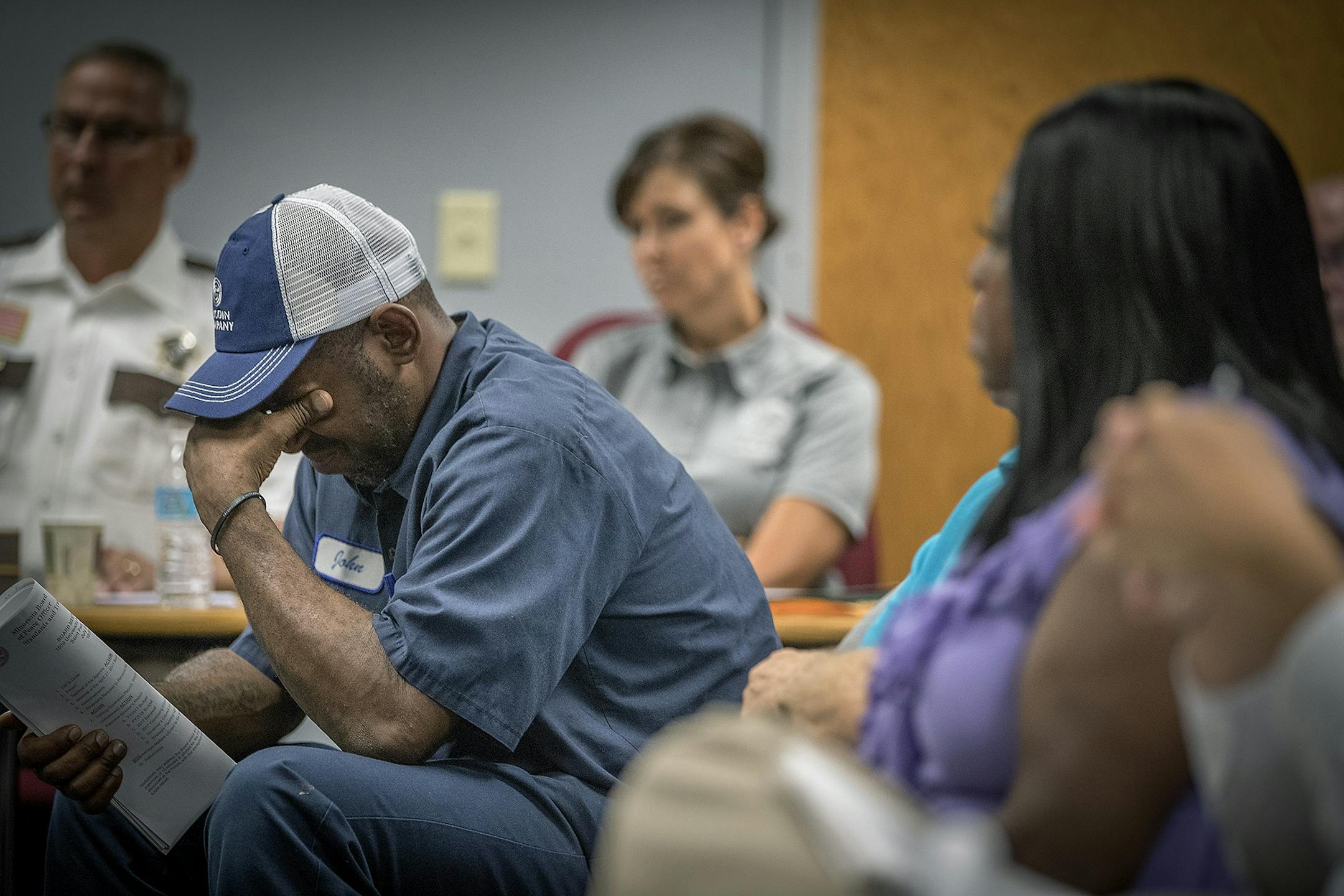 John Thompson, a friend of Philando Castile, reacted after the Board of Peace Officer Standards and Training (POST) voted against a request from Gov. Mark Dayton that a new law enforcement training fund approved by the Legislature this year be named for Philando Castile, Thursday, July 27, 2017 in St. Paul, MN.