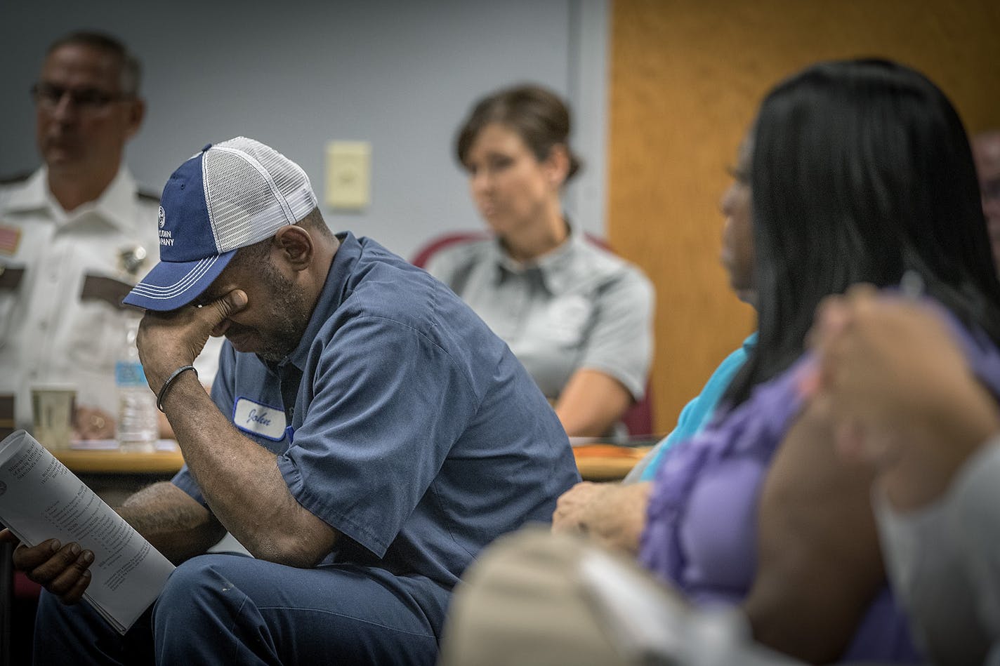 John Thompson, a friend of Philando Castile, reacted after the Board of Peace Officer Standards and Training (POST) voted against a request from Gov. Mark Dayton that a new law enforcement training fund approved by the Legislature this year be named for Philando Castile, Thursday, July 27, 2017 in St. Paul, MN.