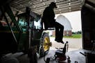 Scott Collier was paralyzed in a farm accident two years ago. He was able to get back to farming with help from the AgrAbility program by modifying an