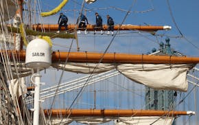 Sailors work on the yard arms of the Cuauhtémoc, Sunday, May 18, 2025 in New York. The masted Mexican Navy training ship collided with the Brooklyn B