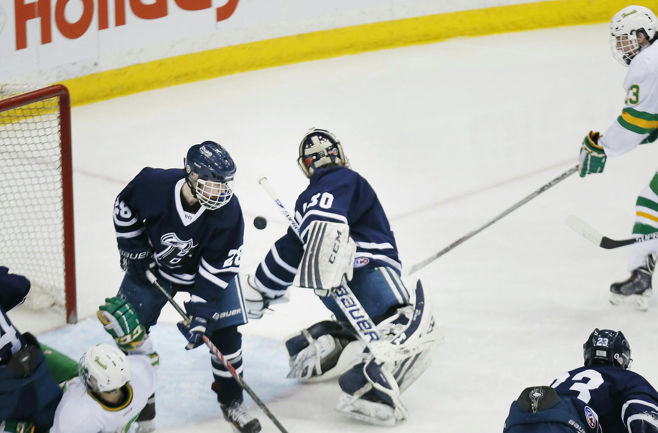 Bram Scheerer right of Edina scored over Bemidji goalkeeper Grant Tharaldson in the second period . Edina played Bemidji in Class 2A quarterfinals boy's hockey state tournament at the Xcel Energy Center Thursday March 5, 2015 in St. Paul, Minnesota. ] Jerry Holt/ Jerry.Holt@Startribune.com