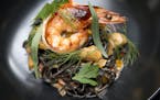 Spaghetti Nero with prawns, mussels, octopus, fra diavolo and fines herbes at Spoon and Stable.