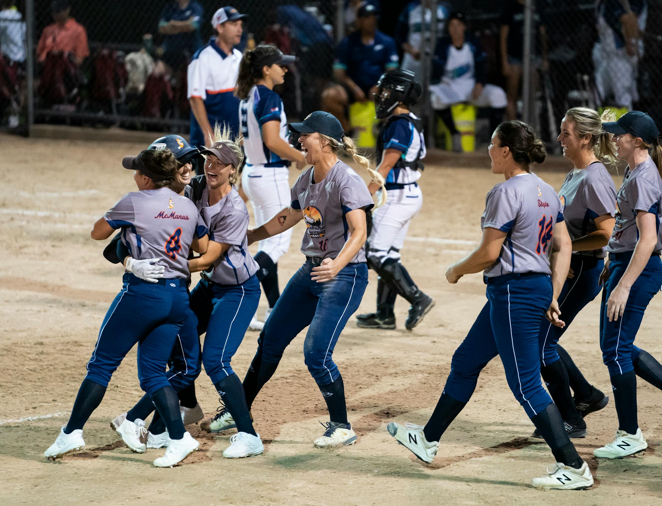 The Aussie Peppers celebrated their comeback win in the bottom of the seventh inning against the Canadian Wild in North Mankato, Minn. Wednesday, July 3, 2019. ] RENEE JONES SCHNEIDER ¥ renee.jones@startribune.com