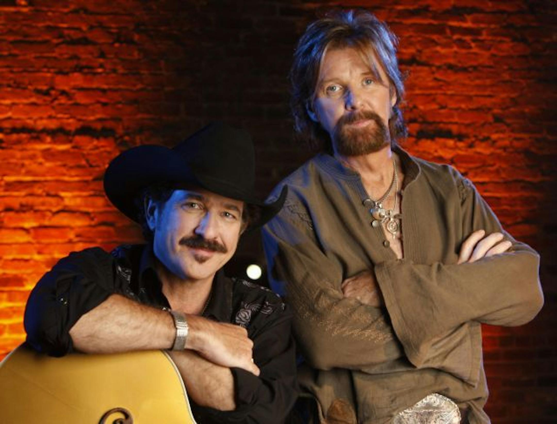 FILE - In this Sept. 12, 2007 file photo, Kix Brooks, left, and Ronnie Dunn of the country duo Brooks & Dunn pose for a portrait at The Factory in Franklin, Tenn.