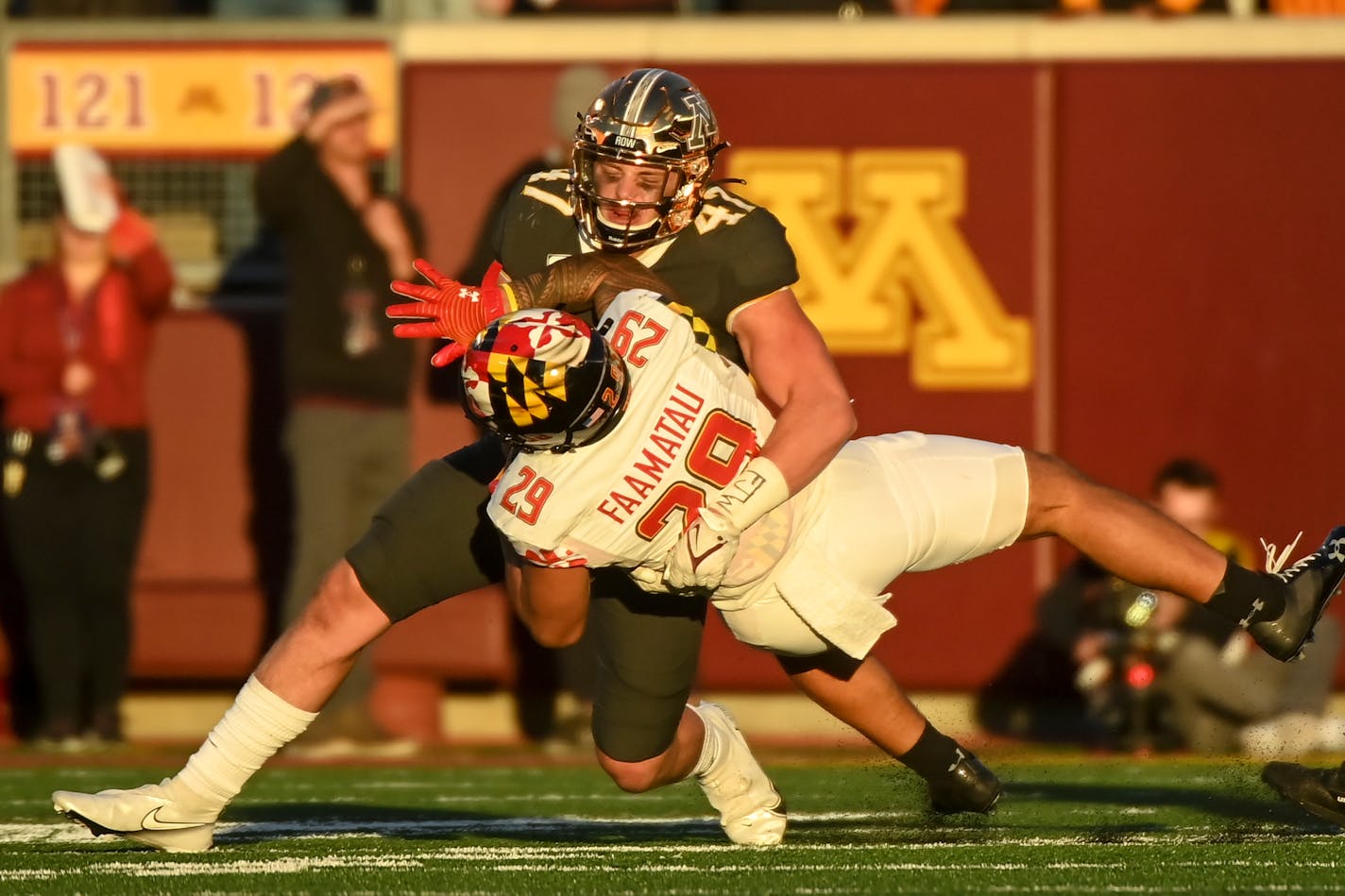 Minnesota Gophers linebacker Jack Gibbens (47) tackles Maryland Terrapins running back Challen Faamatau (29) during the fourth quarter of a football game between the University of Minnesota Gophers and the Maryland Terrapins Saturday, Oct. 23, 2021 at Huntington Bank Stadium in Minneapolis, Minn. ] AARON LAVINSKY • aaron.lavinsky@startribune.com