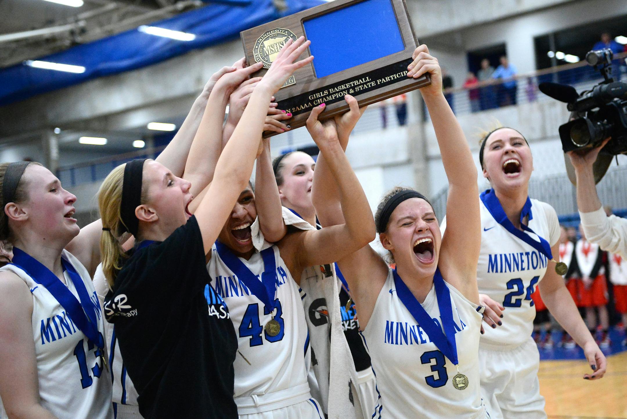 Minnetonka players celebrated after defeating Shakopee in the Class 4A, Section 2 girls' basketball final Friday. ] (AARON LAVINSKY/STAR TRIBUNE) aaron.lavinsky@startribune.com Minnetonka played Shakopee in the Class 4A, Section 2 girls' basketball final on Friday, March 11, 2016 at Hopkins High School in Minnetonka, Minn.