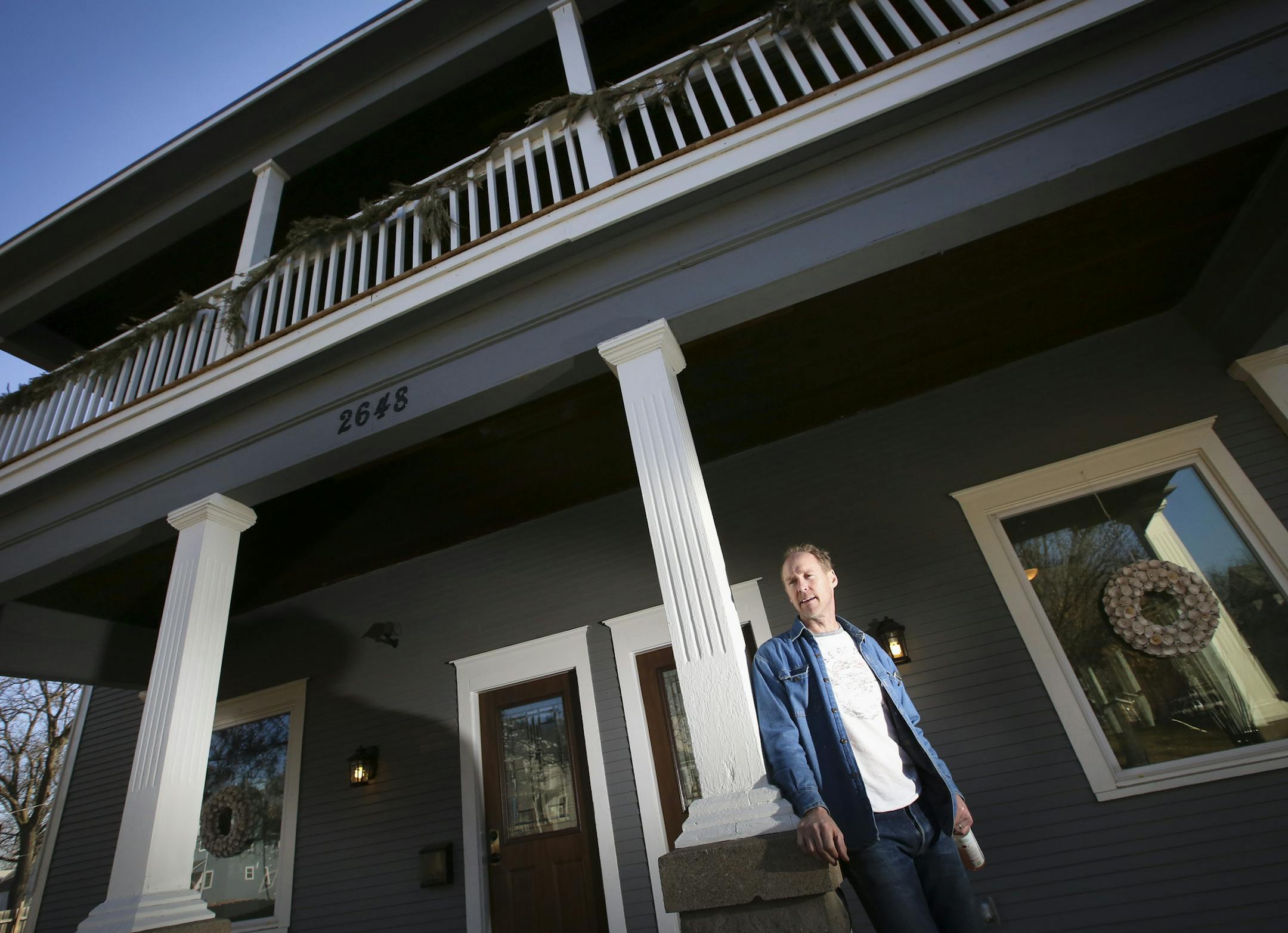 Charlie Browning stood on the porch of the home he completely renovated on Emerson Ave. N. in Minneapolis, Minn., on Friday, March 13, 2015. ] RENEE JONES SCHNEIDER • reneejones@startribune.com