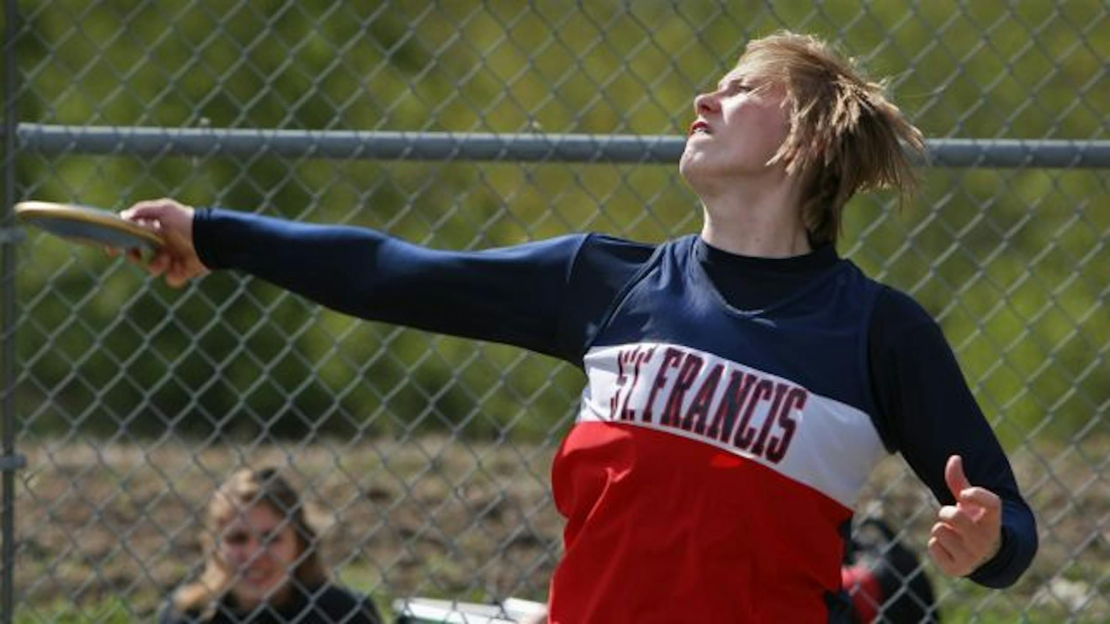 Maggie Ewen of the St. Francis track team tossed the disc during competition at the True Team section meet at St. Michael-Albertville high school.