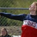 Maggie Ewen of the St. Francis track team tossed the disc during competition at the True Team section meet at St. Michael-Albertville high school.