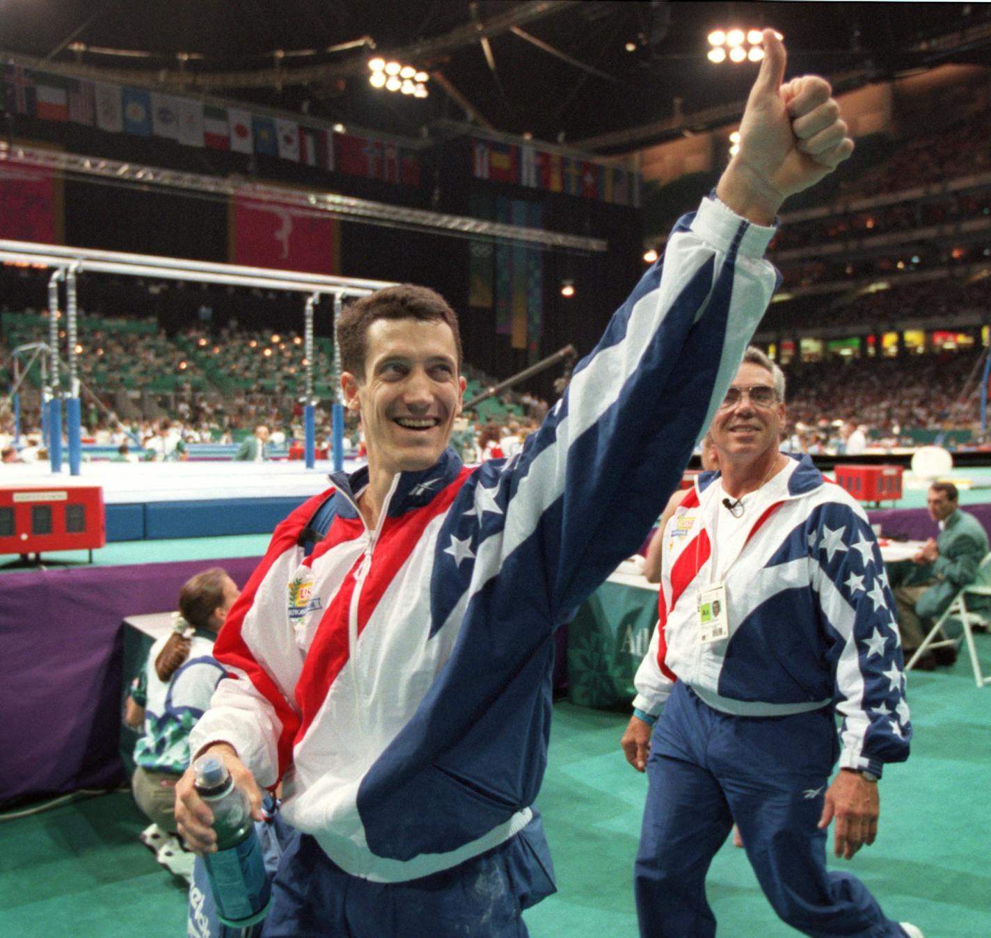 The Olympic menís gymnastics individual all-around competition, with John Roethlisberger from Minnesota taking seventh place at the end of the day. -- At the end of the afternoonís all-around competition, John Roethlisberger acknowleged the cheers of the crowd in the Georgia Dome as he left the floor, followed by his father and coach, Fred Roethlisberger.