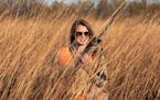 Abby Stone, 27, of Des Moines, Iowa, who learned to hunt pheasants after moving to Iowa from Illinois to attend college, isn't a diehard basketball fa