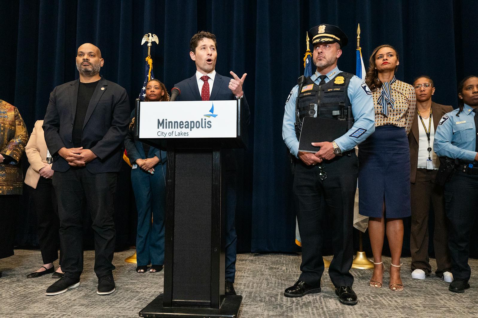 Minneapolis Jacob Frey, center, and Police Chief Brian O’Hara, right, address the dismissal of the federal consent decree during a press conference on Monday at City Hall.