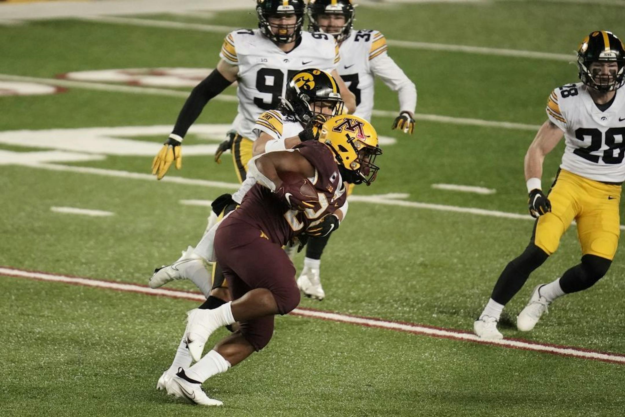 Minnesota Gophers running back Mohamed Ibrahim (24) ran for a first down in the second quarter.