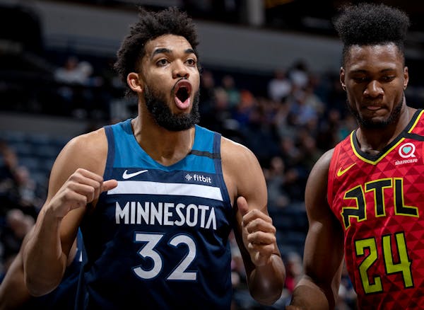The Timberwolves' Karl-Anthony Towns reacts after being called for a foul in the first half against the Hawks at on Feb. 5 at Target Center