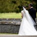 Pippa Middleton, second right and James Matthews walk, after their wedding ceremony, at St Mark's Church in Englefield, England Saturday, May 20, 2017