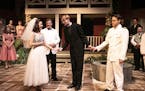 A friar (Neal Beckman, in black) attempts to wed Hero (Samantha Fairchild) and Claudio (Jacob Hooper). It doesn’t go well.