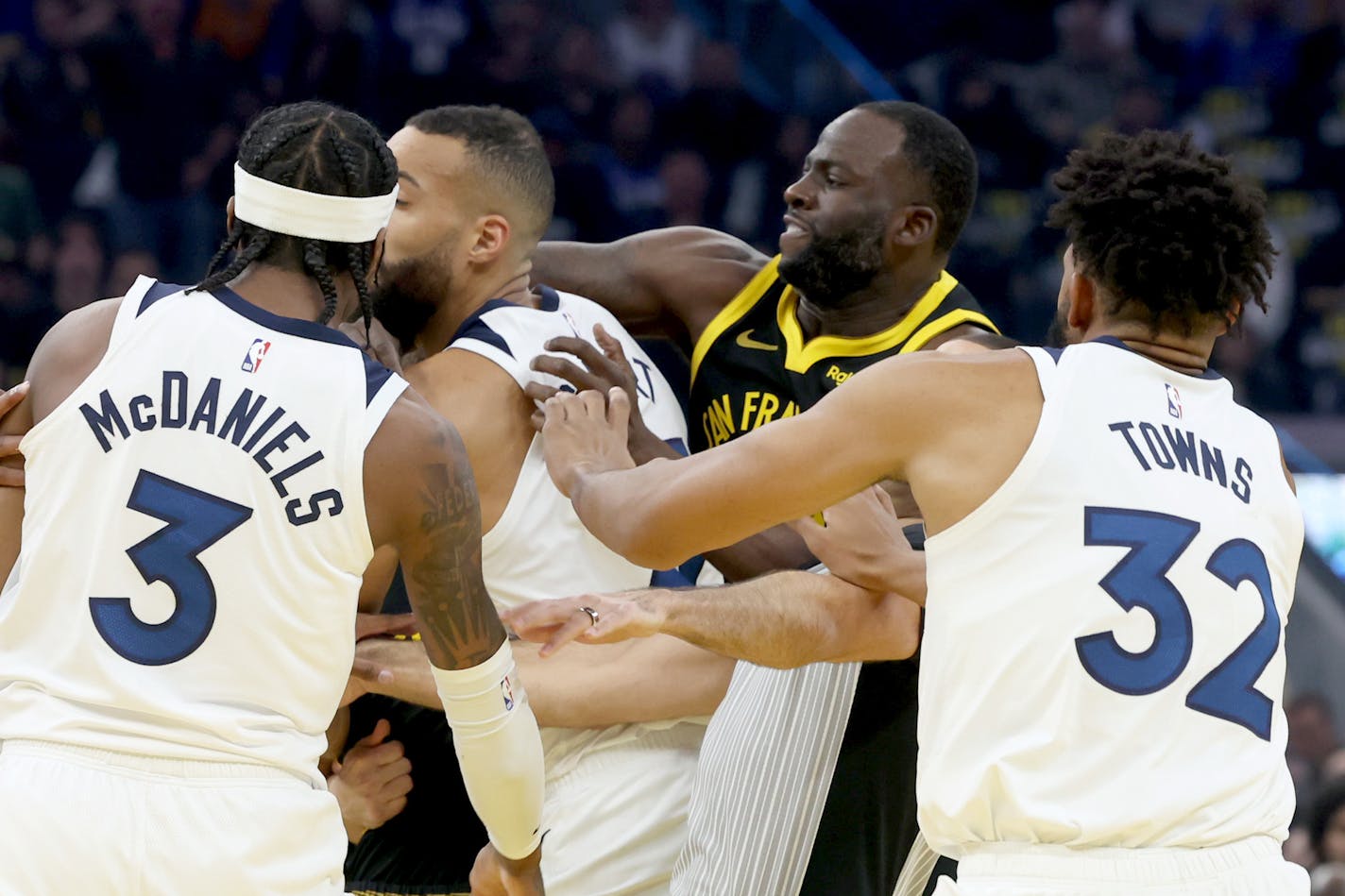 Golden State Warriors forward Draymond Green (23) gets in a confrontation between teammate Klay Thompson (11) and Minnesota Timberwolves forward Jaden McDaniels (3) in the first quarter of a NBA game at Chase Center in San Francisco, on Tuesday, Nov. 14, 2023. (Ray Chavez/Bay Area News Group/TNS) ORG XMIT: 95394207W