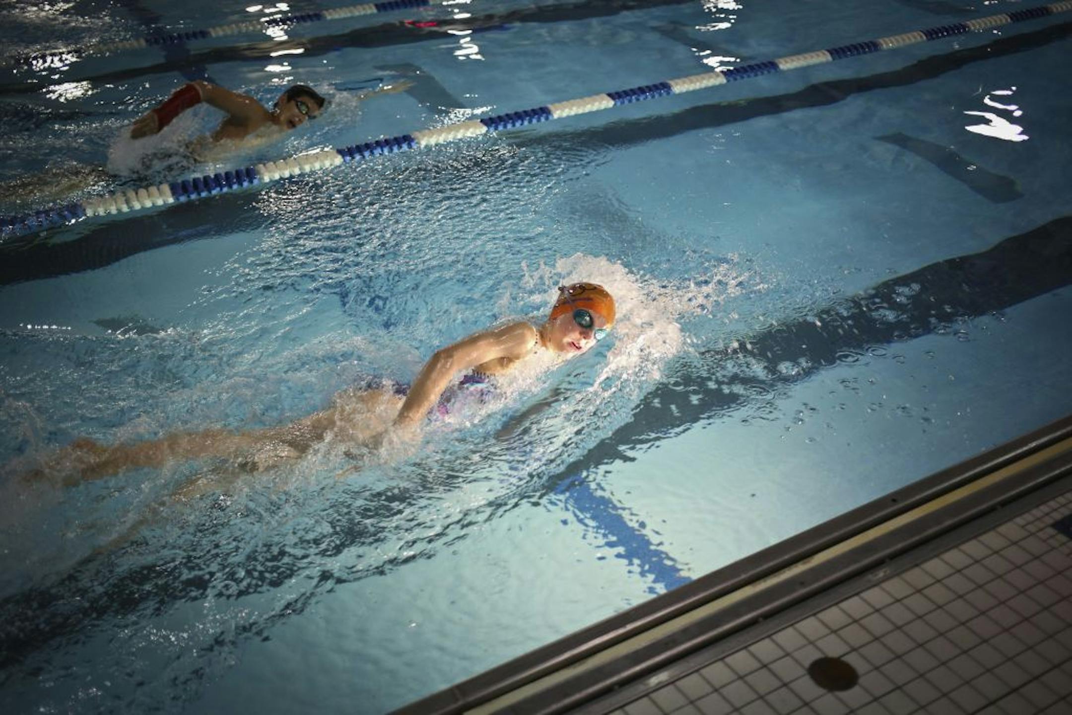 10-year-old Regan Smith of Lakeville, a member of the South Metro Swarm swim club, broke four national age group records this month -- records held by future Olympians. She swam at practice at Kenwood Trail Middle School in Lakeville, Minn. on Monday, January 28, 2013.