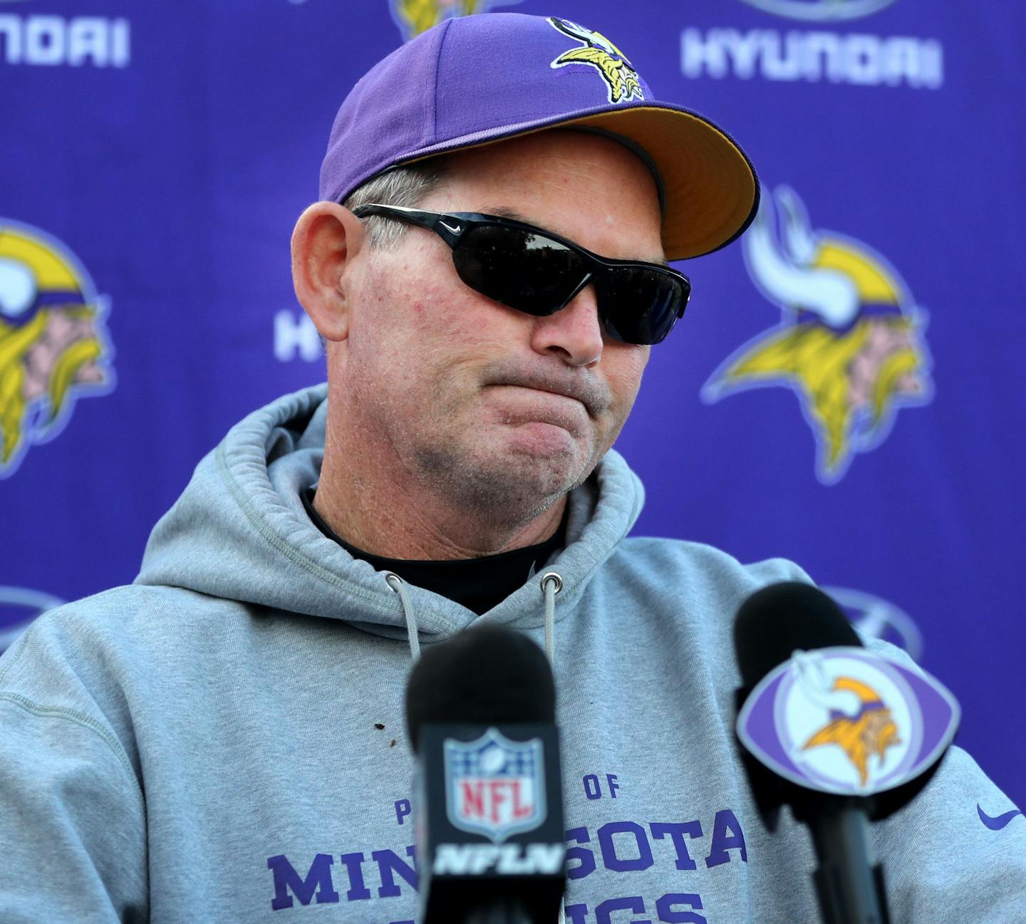 Minnesota Vikings' head coach Mike Zimmer wore sunglasses to his press conference, revealing he had undergone surgery the day before for a torn retina and that Vikings' offensive coordinator Norv Turner had resigned Wednesday, Nov. 2, 2016, at Winter Park in Eden Prairie, MN. Tight ends coach Pat Shurmur will become the interim offensive coordinator.](DAVID JOLES/STARTRIBUNE)djoles@startribune.com Vikings press conference