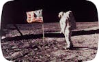 STAR TRIBUNE PHOTO ILLUSTRATION FILE - In this image provided by NASA, astronaut Buzz Aldrin poses for a photograph beside the U.S. flag deployed on t