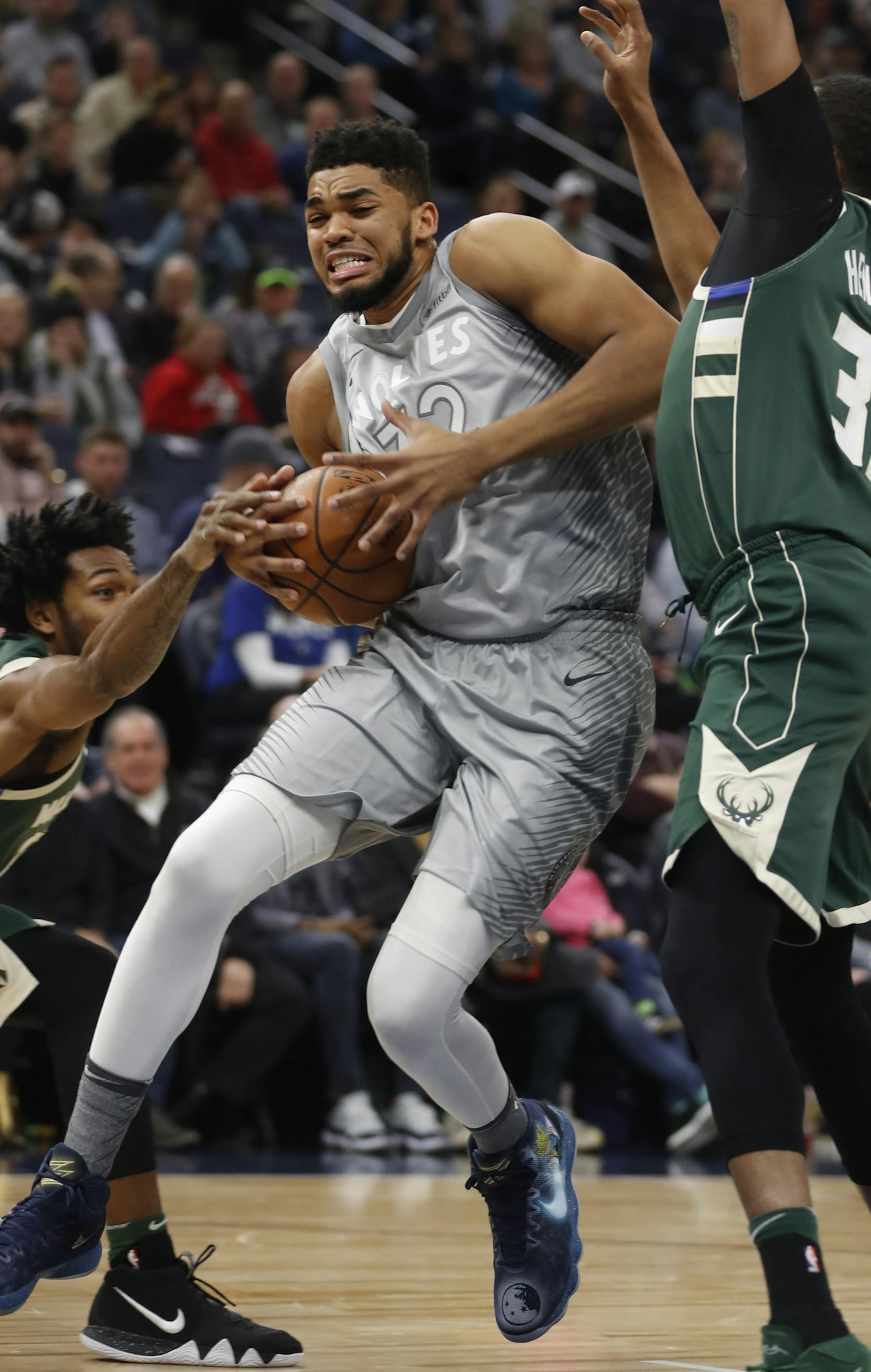 Karl-Anthony Towns(32) penetrated as John Henson(31) of the Bucks guarded.]Timberwolves play Milwaukee Bucks at Target Center on 2/1/2018. the Richard Tsong-Taatarii&#xef;rtsong-taatarii@startribune.com