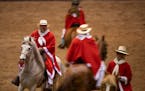 The Amigo De Los Pasos Drill Team, including Barry Moszer of Albert Lea, left, rode their Peruvian horses in formation during the breed demonstrations