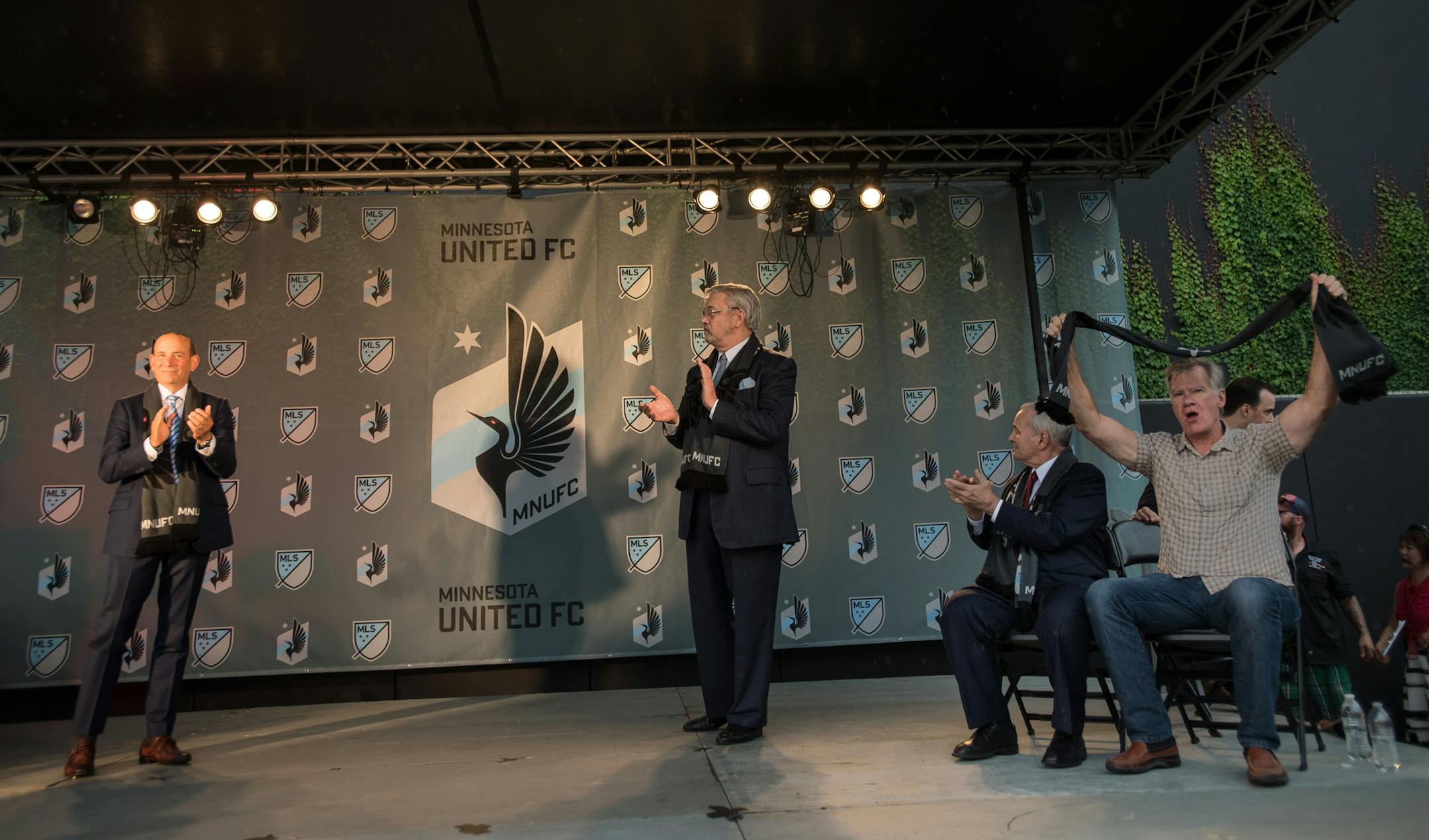 From left, Major League Soccer Commissioner Don Garber, Minnesota United majority owner Dr. William McGuire, Minnesota Governor Mark Dayton and St. Paul Mayor Chris Coleman celebrated after the new, slightly-modified Minnesota United FC MLS logo, was unveiled Friday night. ] (AARON LAVINSKY/STAR TRIBUNE) aaron.lavinsky@startribune.com Major League Soccer Commissioner Don Garber, Minnesota United majority owner Dr. William McGuire, Minnesota Governor Mark Dayton and St. Paul Mayor Chris Coleman t