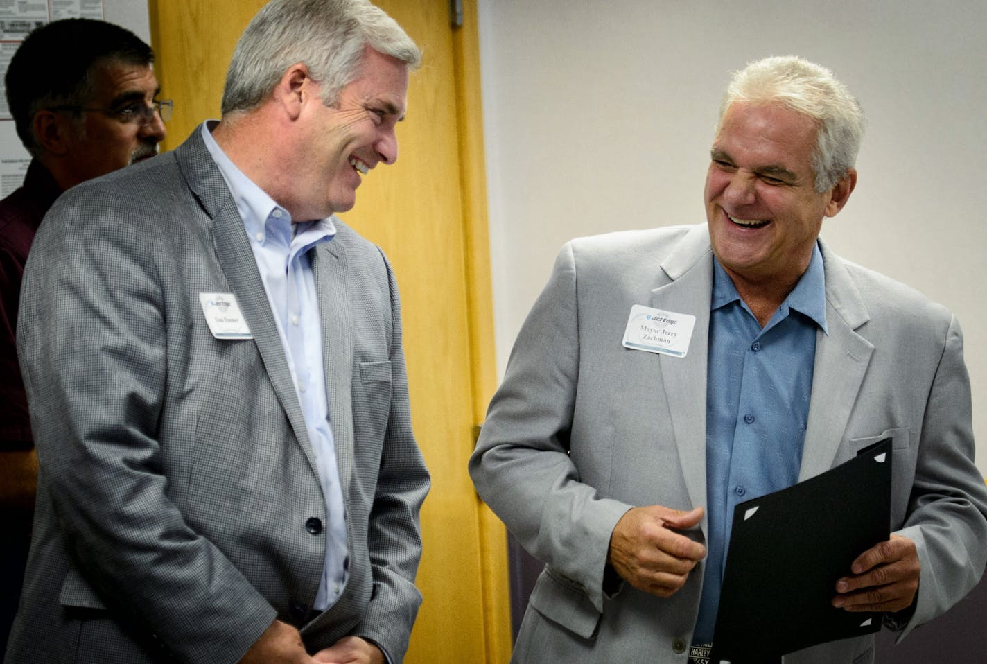 Sixth Congressional District GOP candidate Tom Emmer joked with St. Michael Mayor Jerry Zachman during the visit. He visited Jet Edge Waterjet Systems in St. Michael. The company is celebrating its 30th anniversary. ] St. Michael , MN -- Wednesday, September 3, 2014. GLEN STUBBE * gstubbe@startribune.com