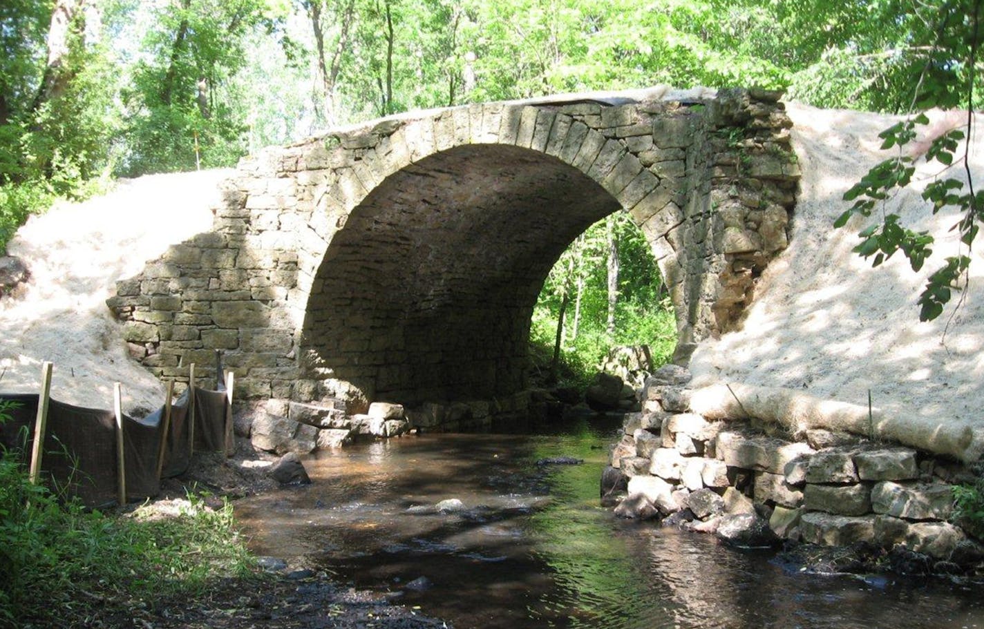 Minnesota Department of Transportation The Point Douglas-St. Louis River Road Bridge near Stillwater was built in 1863 from local quarried limestone rock. The bridge once carried part of the Point Douglas-Superior Military Road over Brown&#x201a;&#xc4;&#xf4;s Creek. The 185-mile road was chartered by Congress to connect the Mississippi River with Lake Superior. It is significant as the oldest extant bridge in the state, its association with transportation history and its masonry engineering.