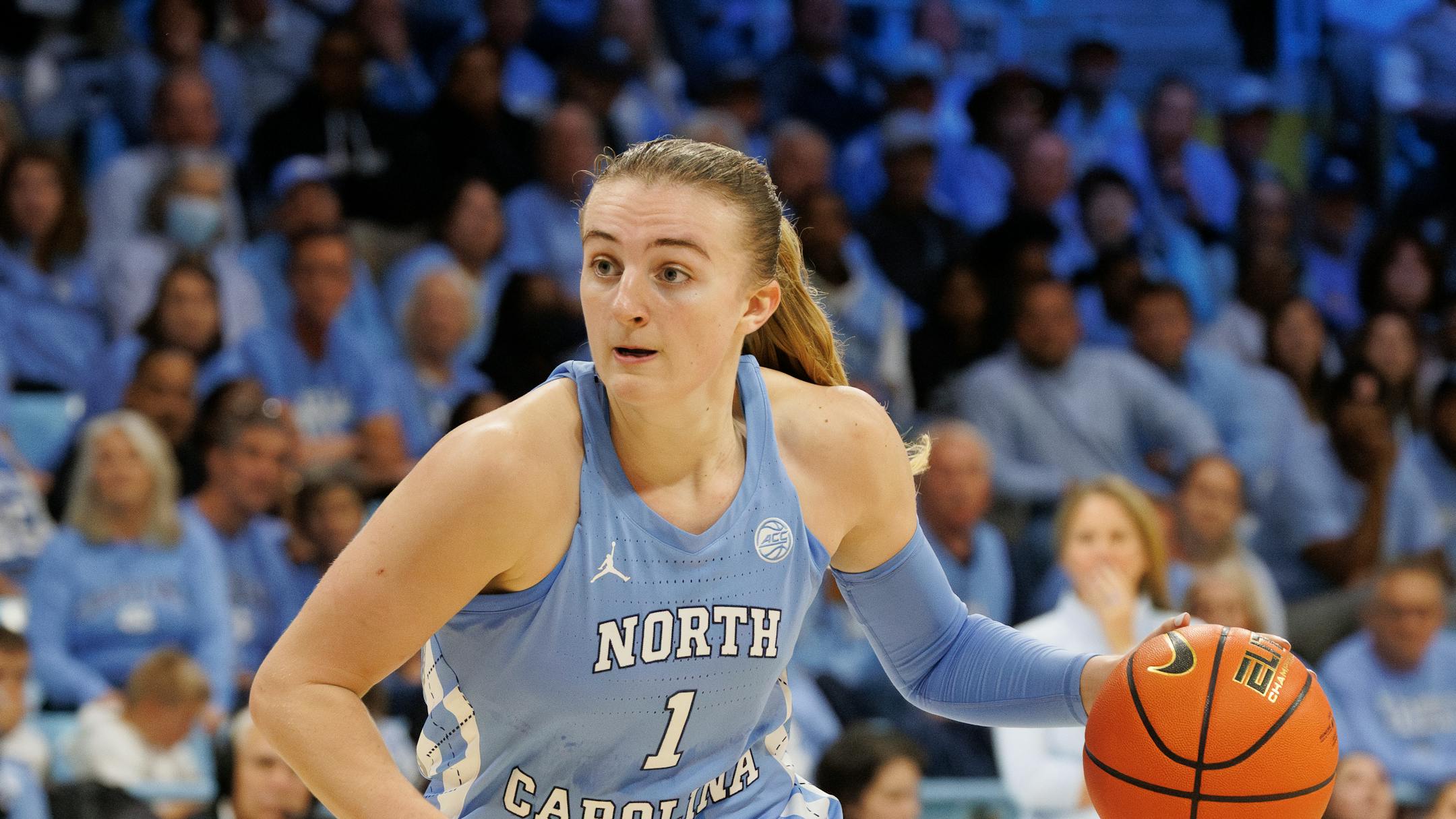 North Carolina's Alyssa Ustby (1) handles the ball during an NCAA basketball game on Thursday, Nov. 30, 2023, in Chapel Hill, N.C. (AP Photo/Ben McKeown)